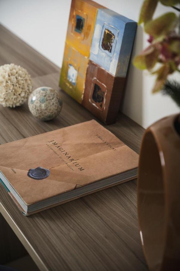 Hotel Embassy ริชโชเน ภายนอก รูปภาพ